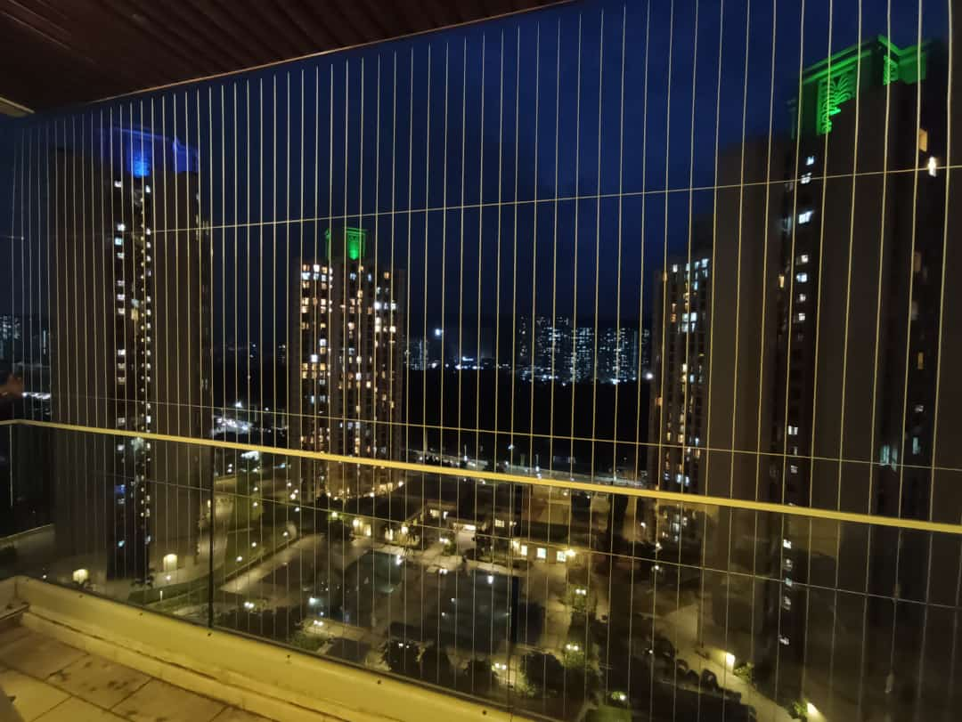 Invisible Grills installation by Sweta Invisible Grill for balcony, window and child safety in Gurugram, Delhi NCR and Noida